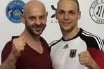 powiększ