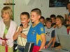 powiększ