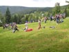 powiększ