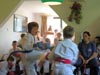 powiększ