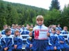 powiększ