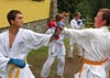 powiększ