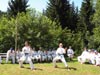 powiększ