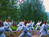 powiększ