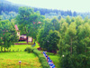 powiększ