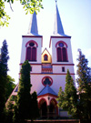 powiększ