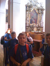 powiększ