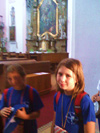 powiększ