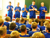 powiększ