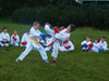 powiększ
