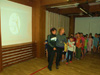 powiększ