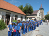 powiększ