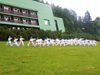 powiększ