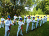 powiększ