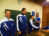 powiększ