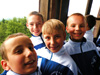 powiększ