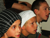 powiększ