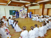 powiększ