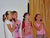 powiększ