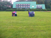 powiększ