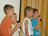powiększ