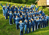 powiększ