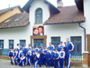 powiększ