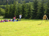 powiększ