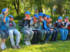 powiększ
