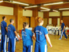 powiększ