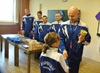 powiększ