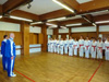powiększ