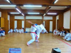 powiększ