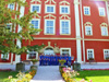 powiększ