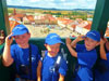 powiększ
