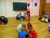 powiększ