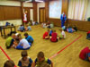 powiększ