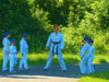 powiększ