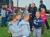 powiększ