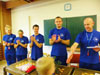 powiększ
