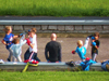 powiększ