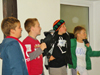 powiększ