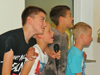 powiększ