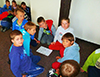 powiększ