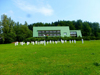 powiększ