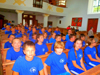 powiększ