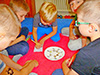 powiększ
