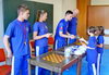 powiększ