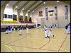 powiększ