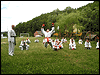 powiększ